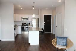 Stylish Campustown Stay with Gym & Balcony