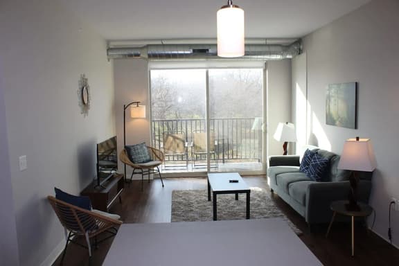 Stylish Campustown Stay with Gym & Balcony
